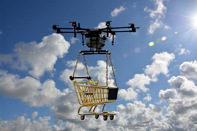 logistic drone carrying a trolley 