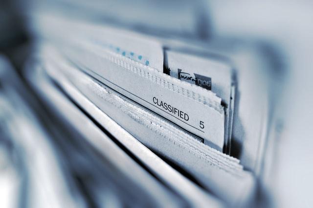 multiple document in a drawer with the word classified written on them